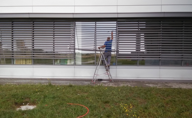 Spalat geamuri si pereti vitrati